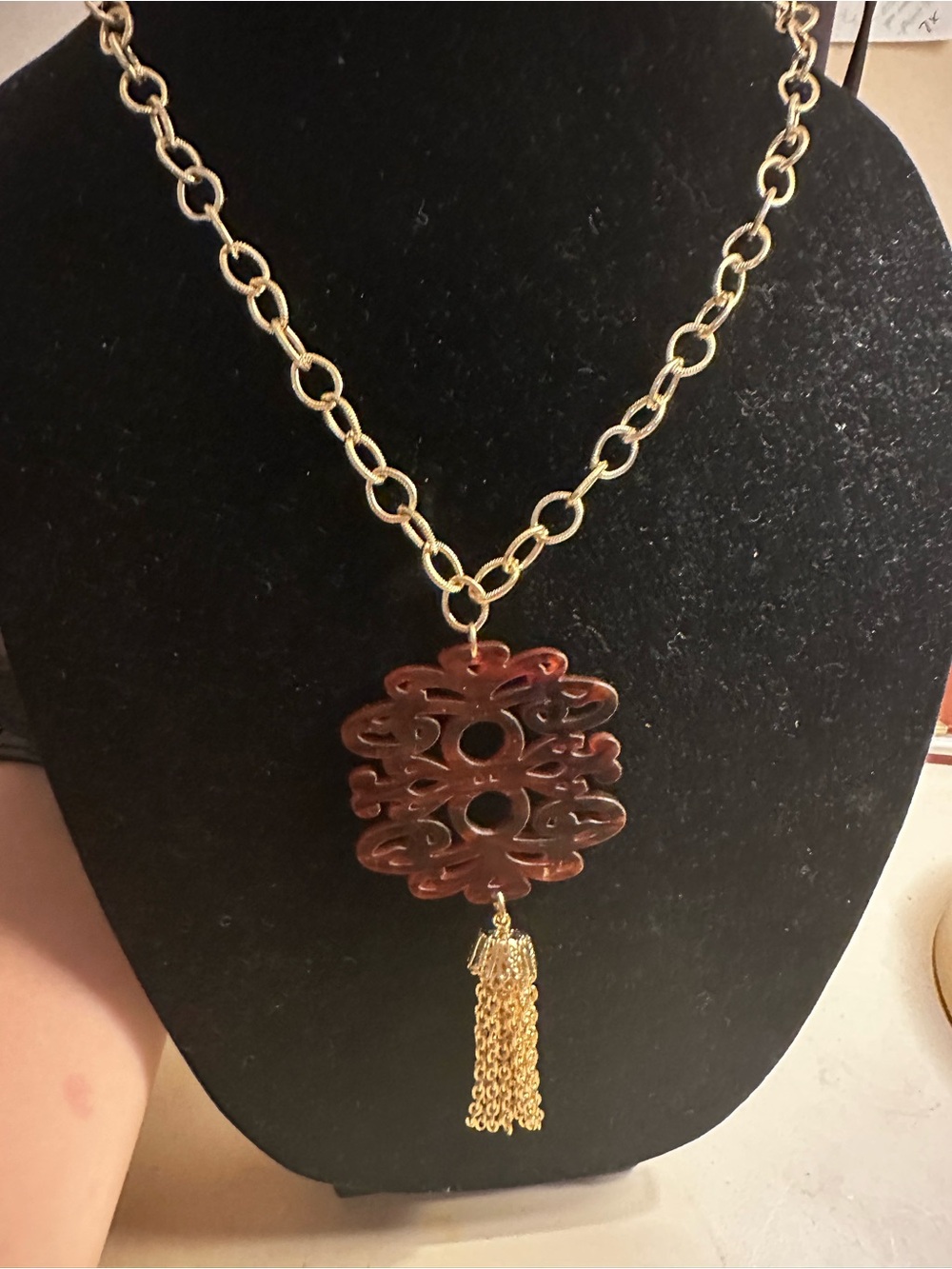 Gold Chain Necklace with Brown Carved Pendant and Tassel